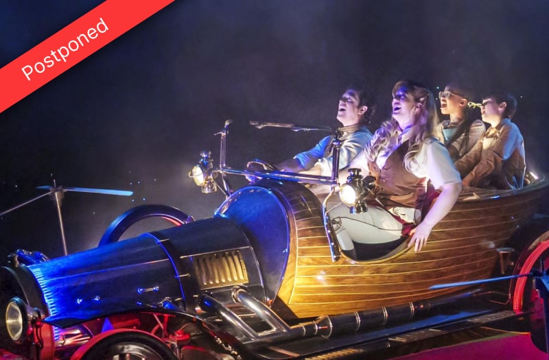 A production photograph shows Chitty in flight, chrome gleaming, red and yellow wings spread out, the Potts family in the seats awestruck against the background of a dark starry night.