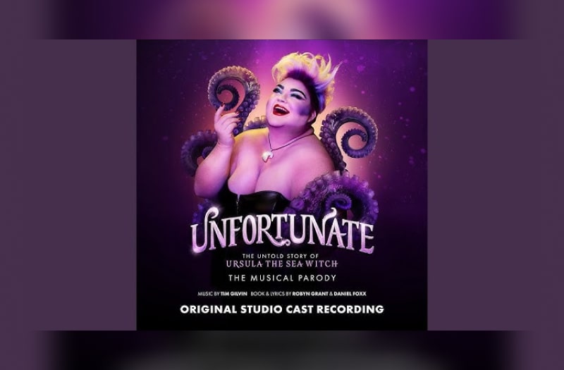 The image for Unfortunate has a photo of Shawna as Ursula. She smiles with red lips, her hair spiky, and her ample bosom encased in a basque. She is surrounded by octopus tentacles against a deep purple background.