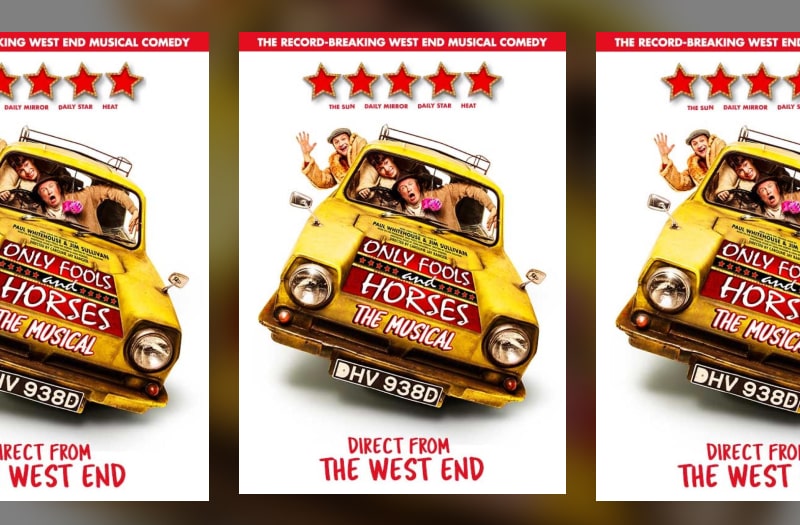 The image shows the Trotters Independent Trading three-wheel yellow van head-on, tilting over as it balances precariously round a tight corner. At the wheel as he leans waving out of the side window is Del Boy in fur coat and flat cap. Crammed inside are Rodney and Grandad.